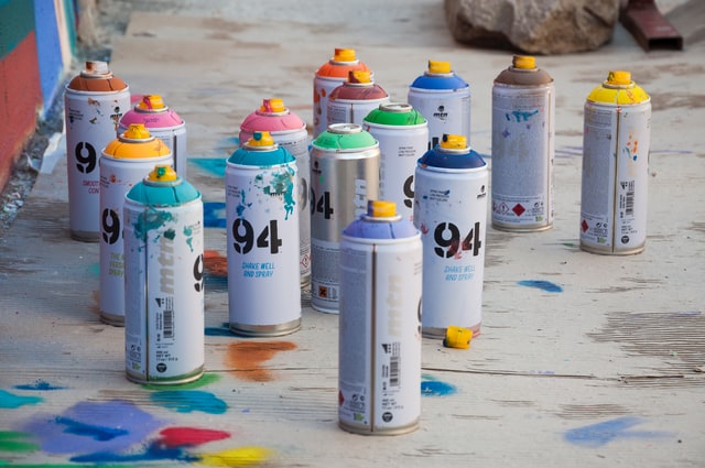 Various cans of MTN 94 spray paint with Banana Universal Caps 